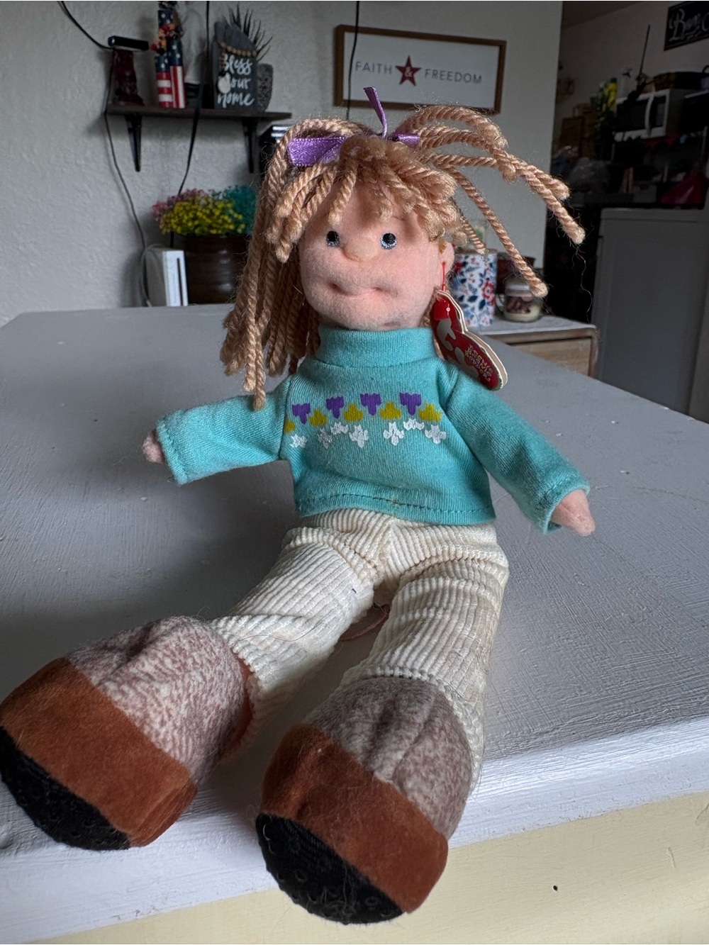 Ty Plush Doll with Teal Sweater, Purple Bow, and Tan Boots